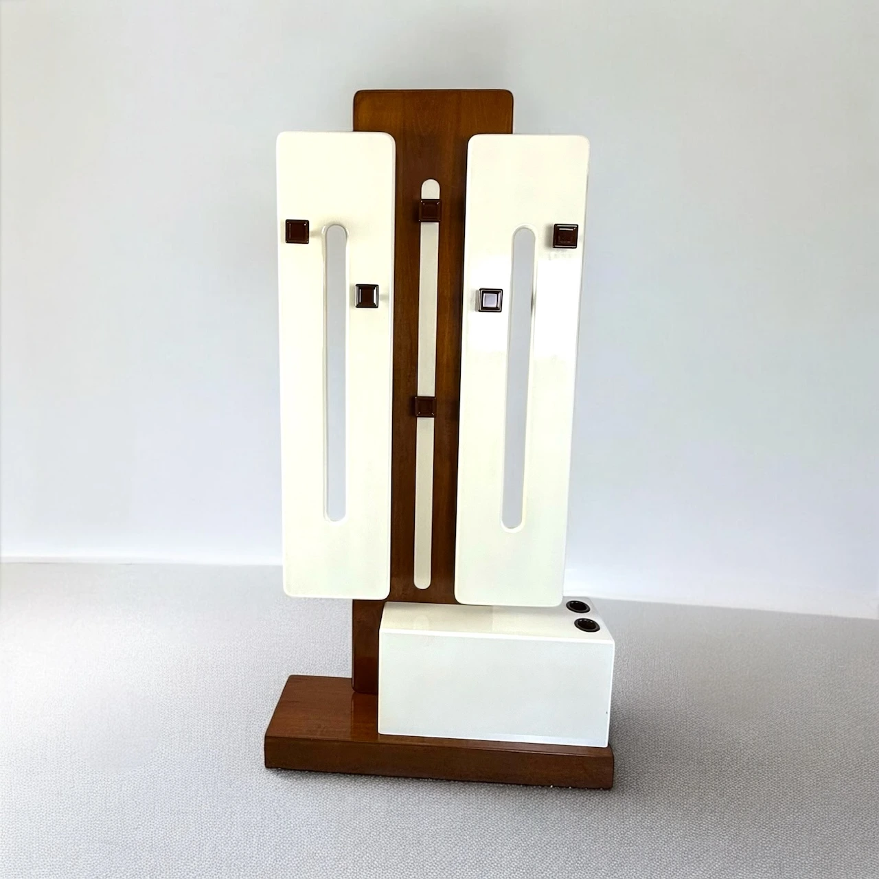 Rare 1960s vintage coat rack in lacquered wood with six foldable hooks and integrated umbrella holders, Italian design